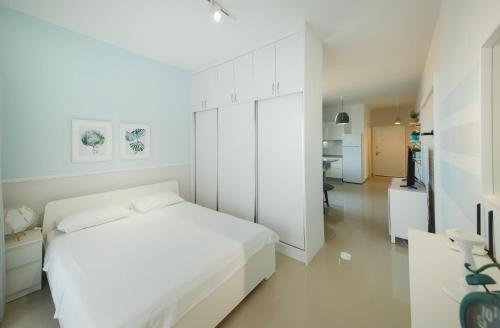 Postel nebo postele na pokoji v ubytování Caesar Resort & SPA
