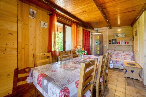 Ένα ή περισσότερα κρεβάτια σε δωμάτιο στο Chalet Lou Murgis