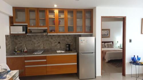 Η κουζίνα ή μικρή κουζίνα στο Hospedaje EMPRESARIAL AV VELASCO ASTETE
