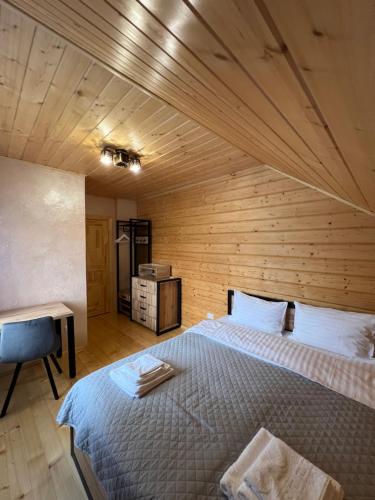 Postel nebo postele na pokoji v ubytování Kolos house