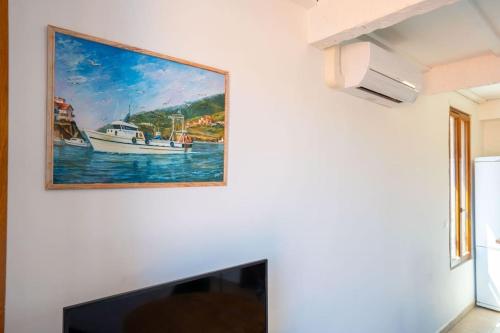 Μια τηλεόραση ή/και κέντρο ψυχαγωγίας στο Chez Terry