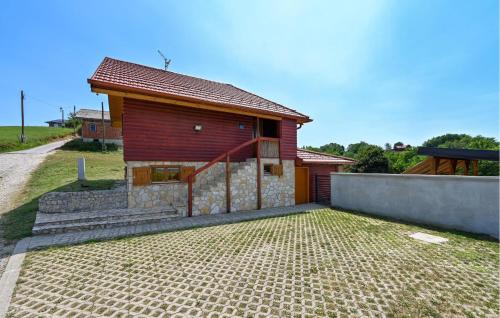 a small house with a brick driveway in front of it at Stunning Home In Vinogradi Ludbreski in Ludbreg