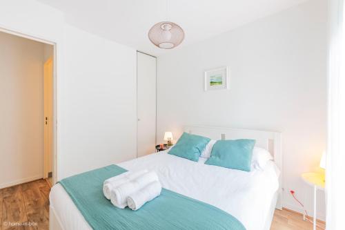 Postel nebo postele na pokoji v ubytování Charmant T3 familial pour 8, 5min Disney, 2Parkings