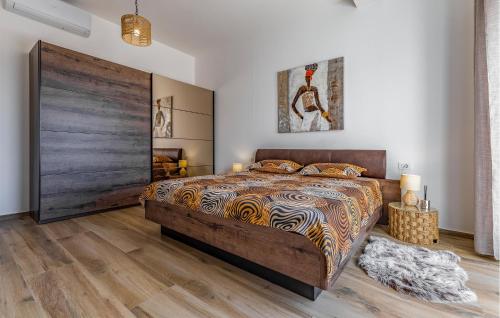 Katil atau katil-katil dalam bilik di Cozy Home In Medulin With Sauna