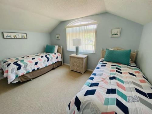 En eller flere senge i et værelse på The Sunshine Home