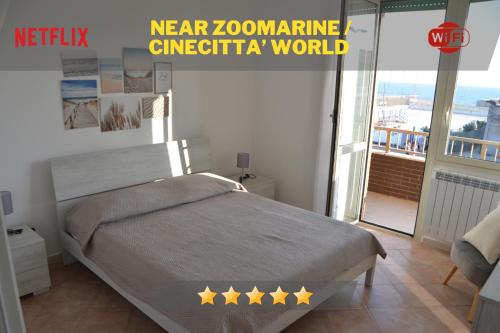 Кровать или кровати в номере Appartamento Miramare - Sea view
