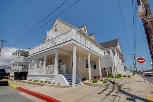 a white house on the corner of a street at Ocean Lodge Hotel South in Ocean City