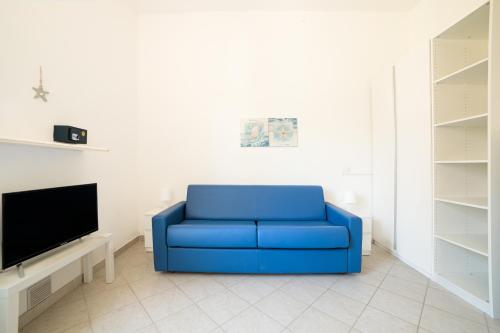 Μια τηλεόραση ή/και κέντρο ψυχαγωγίας στο Acquamarina Appartamenti