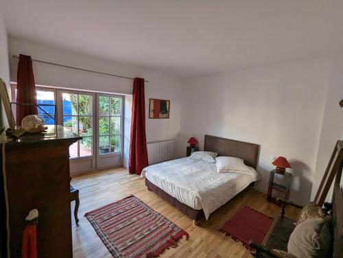 Postel nebo postele na pokoji v ubytování Hameau du Moulin d Almont