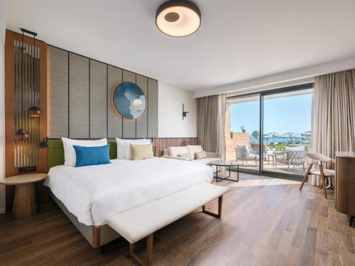 Postel nebo postele na pokoji v ubytování Anda Barut Collection - Ultra All Inclusive