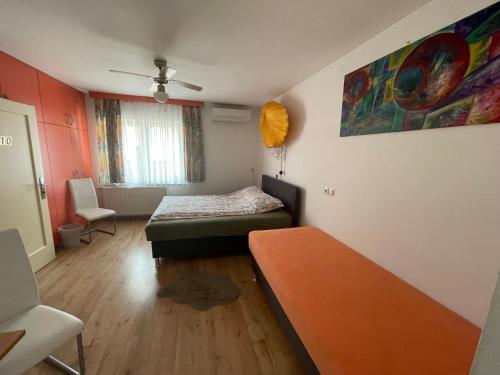 Voodi või voodid majutusasutuse Guesthouse Stremljan Ljubljana toas