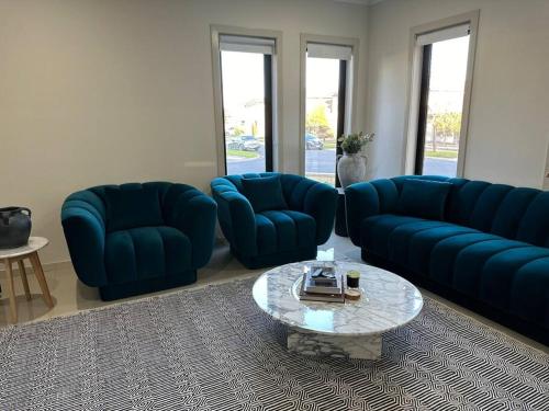 Χώρος καθιστικού στο Luxurious 4 Bedroom Home in Prime Location