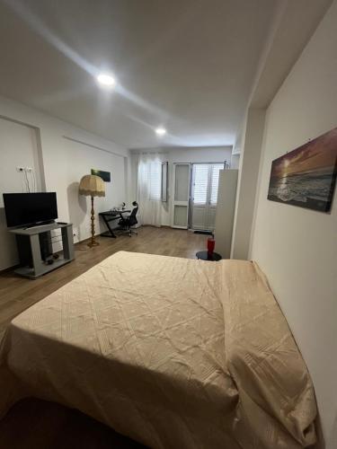 TV a/nebo společenská místnost v ubytování Bed Ponente