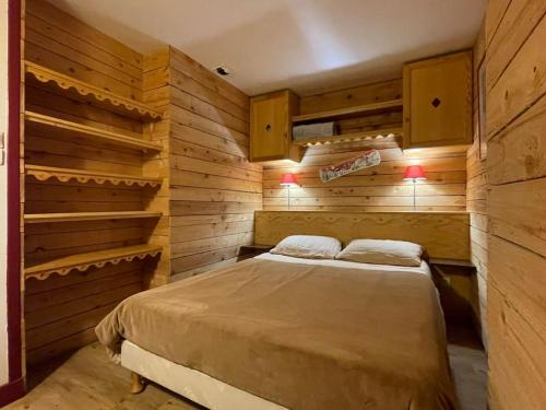 Postel nebo postele na pokoji v ubytování T2 classé 3 étoiles coeur de village et Piscine ext