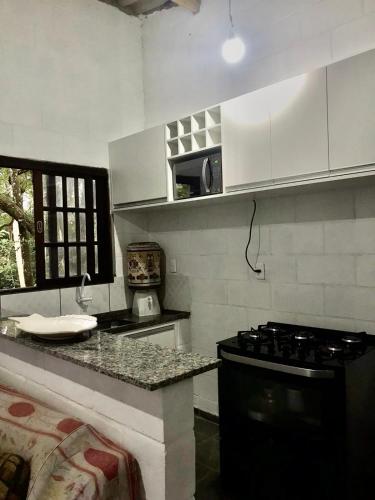 Dapur atau dapur kecil di Chacara Embu