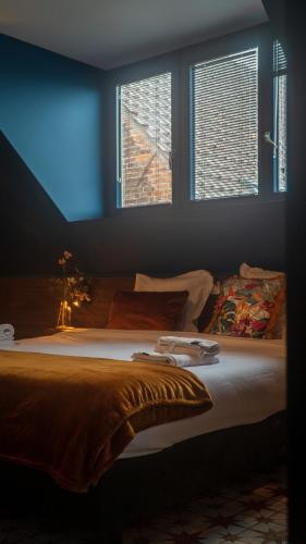 Gran Hotel De Passageにあるベッド