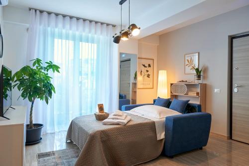 Ένα ή περισσότερα κρεβάτια σε δωμάτιο στο La Marina Apartment Suites