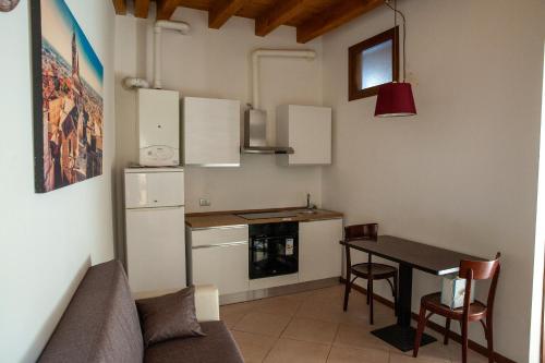 Kuchyň nebo kuchyňský kout v ubytování La Corte Salesiana - flat