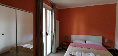 Postel nebo postele na pokoji v ubytování B8 Parma