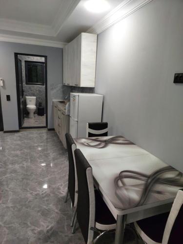 Kuchyň nebo kuchyňský kout v ubytování Apartment BESO