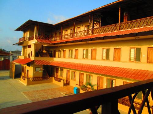 a view of a building with red roof at Hotel Mediterraneo in Canoa