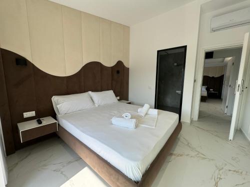 Katil atau katil-katil dalam bilik di Villa AX Mirage