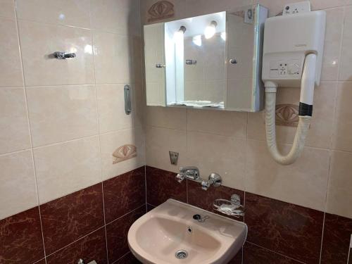 Koupelna v ubytování Rony Hotel