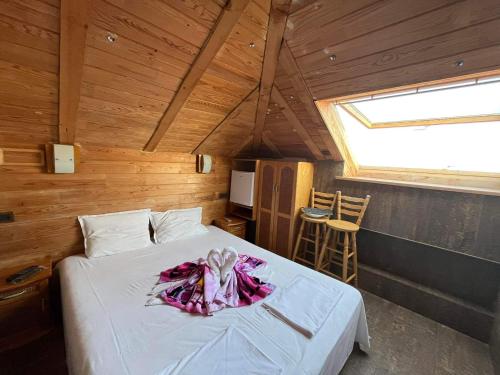 Postel nebo postele na pokoji v ubytování Rony Hotel
