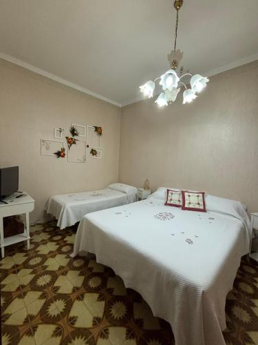 Postel nebo postele na pokoji v ubytování Casa Centamore
