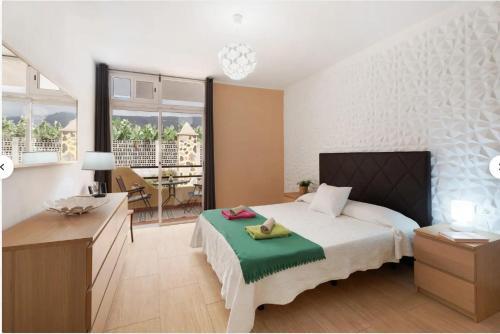 Postel nebo postele na pokoji v ubytování Apartamento Marina Palace Playa Paraiso