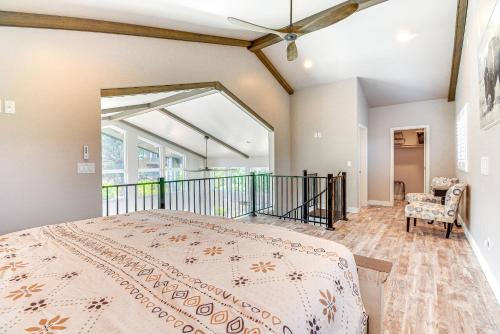 a bedroom with a bed and a large window at Hot Tub and Deck Mtn-View Pine Getaway! in Pine