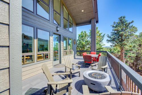 a deck with chairs and a bath tub on a house at Hot Tub and Deck Mtn-View Pine Getaway! in Pine