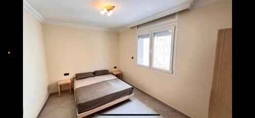 Postel nebo postele na pokoji v ubytování Belles Appartements à côté de la plage