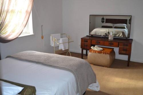 Postel nebo postele na pokoji v ubytování Greyt House selfcatering house in Greyton SA