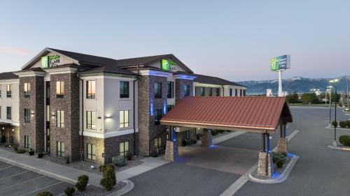 a rendering of a hotel with a red roof at Holiday Inn Express Belgrade-Bozeman Area by IHG in Belgrade