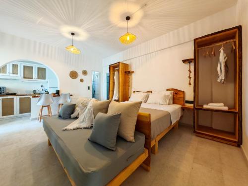 Postel nebo postele na pokoji v ubytování Paraga Suites