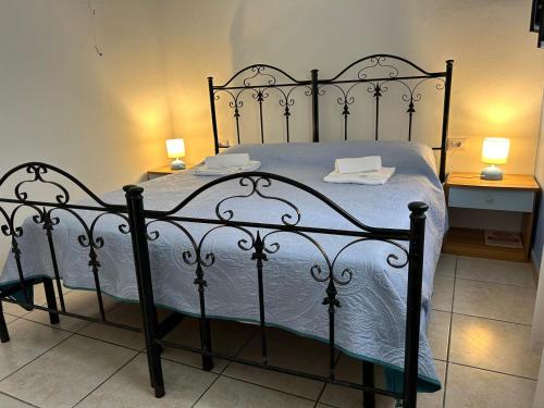 Postel nebo postele na pokoji v ubytování Garden Rooms