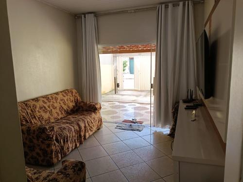 TV/trung tâm giải trí tại Casa Temporada Prado-BA