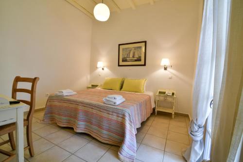 Letto o letti in una camera di Golden Beach Studios & Suites