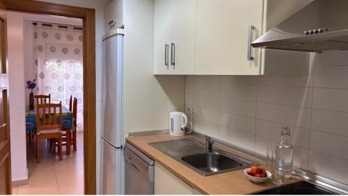 a kitchen with a sink and a counter top at Planta baja en La Torre Golf in Torre-Pacheco