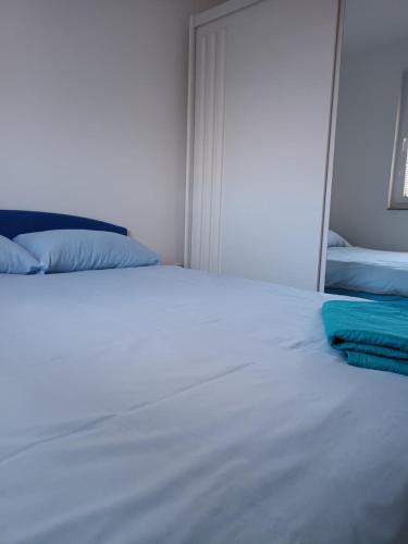 Katil atau katil-katil dalam bilik di Apartman Sunce