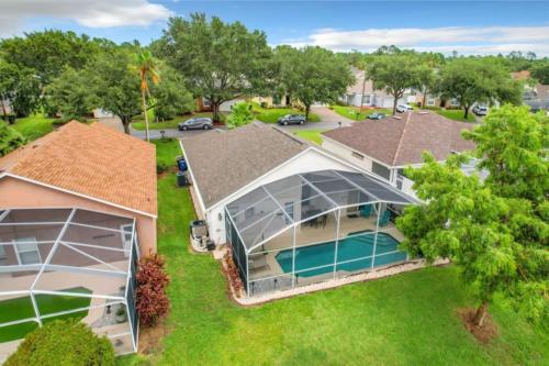 an overhead view of a house with a pool at Sunshine Cove in Haines City