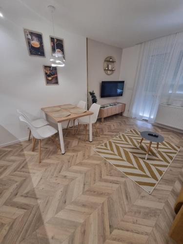 Μια τηλεόραση ή/και κέντρο ψυχαγωγίας στο Exclusive Home Apartman