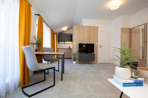 ALURE RESIDENCES 11 - 24h self check-in & private parking next to the apartment building included, CITY CENTER right on SNP Square in a quiet passage, new building, best deal in town
