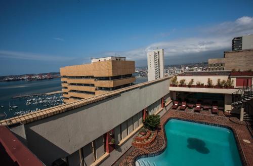 a swimming pool on the roof of a building at The Royal Hotel by Coastlands Hotels & Resorts in Durban