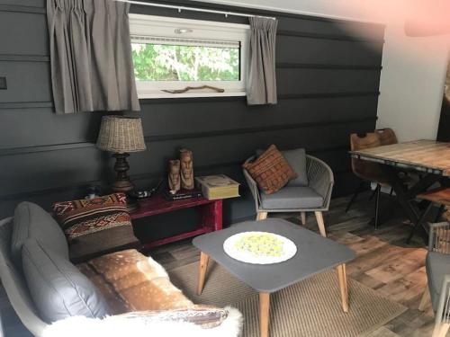 Χώρος καθιστικού στο Chalet 'Het Vinkje'