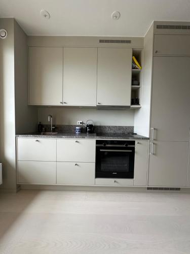 Dapur atau dapur kecil di Superior-svit med havsutsikt