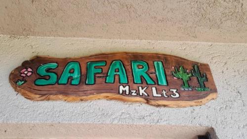 Ein Zertifikat, Auszeichnung, Logo oder anderes Dokument, das in der Unterkunft Casa Safari en La Paisanita, Alta Gracia ausgestellt ist