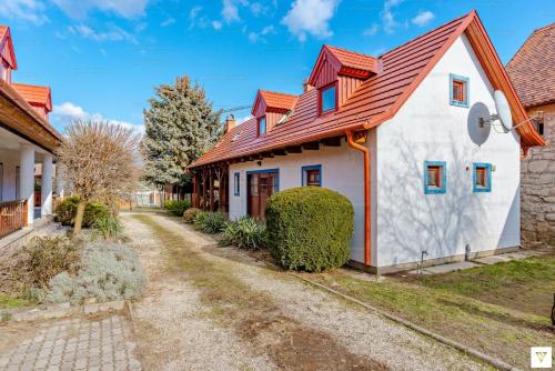 a house with a red roof at Villa Chardonnay Etyek in Etyek