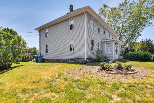 a house with a yard in front of it at Wakefield Escape Walk to Downtown and Near Beaches! in South Kingstown